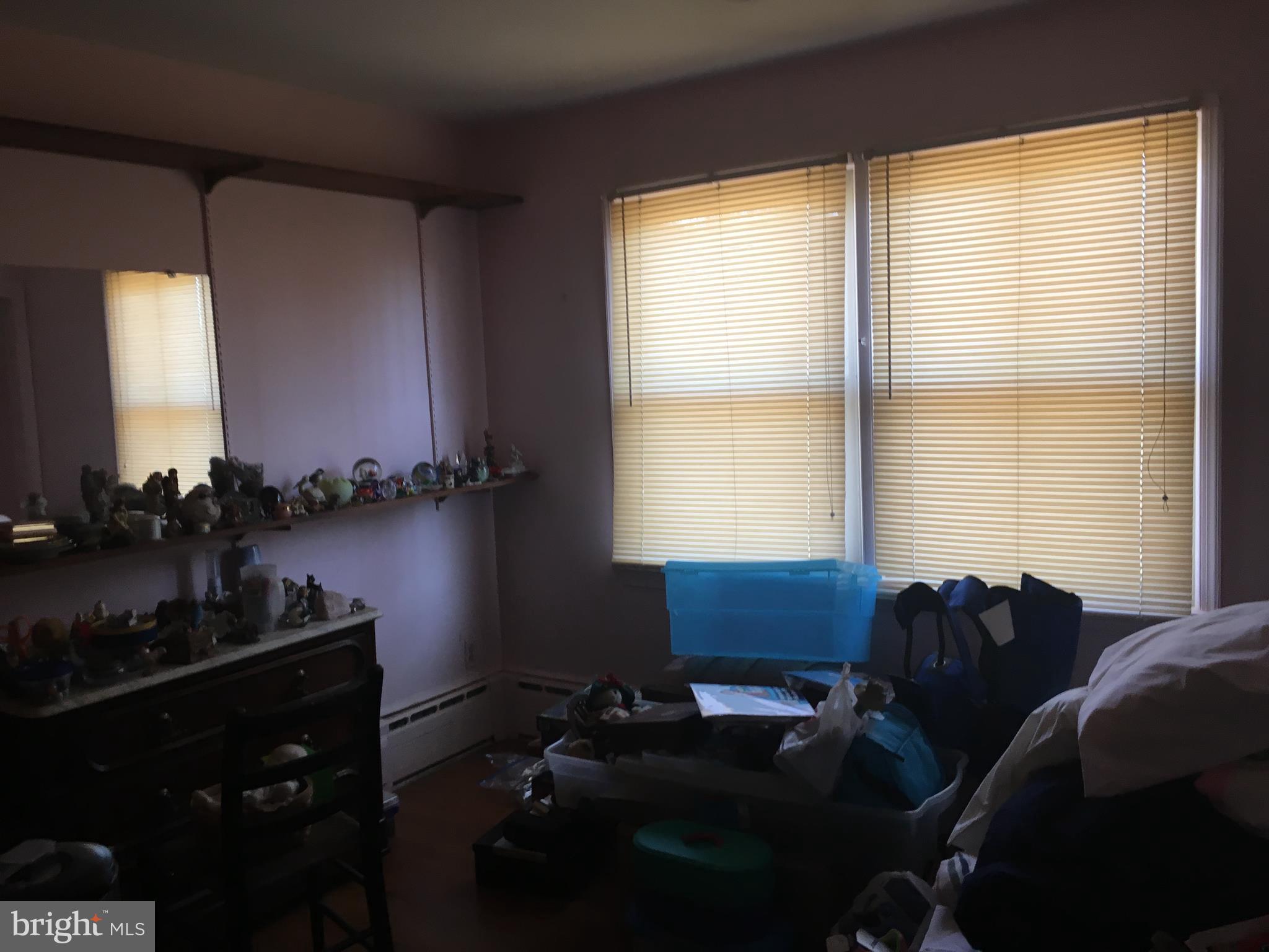 7300 Temple Hill Road Temple Hills, MD 20748 - Photo 6 of 14 a room with furniture and a window