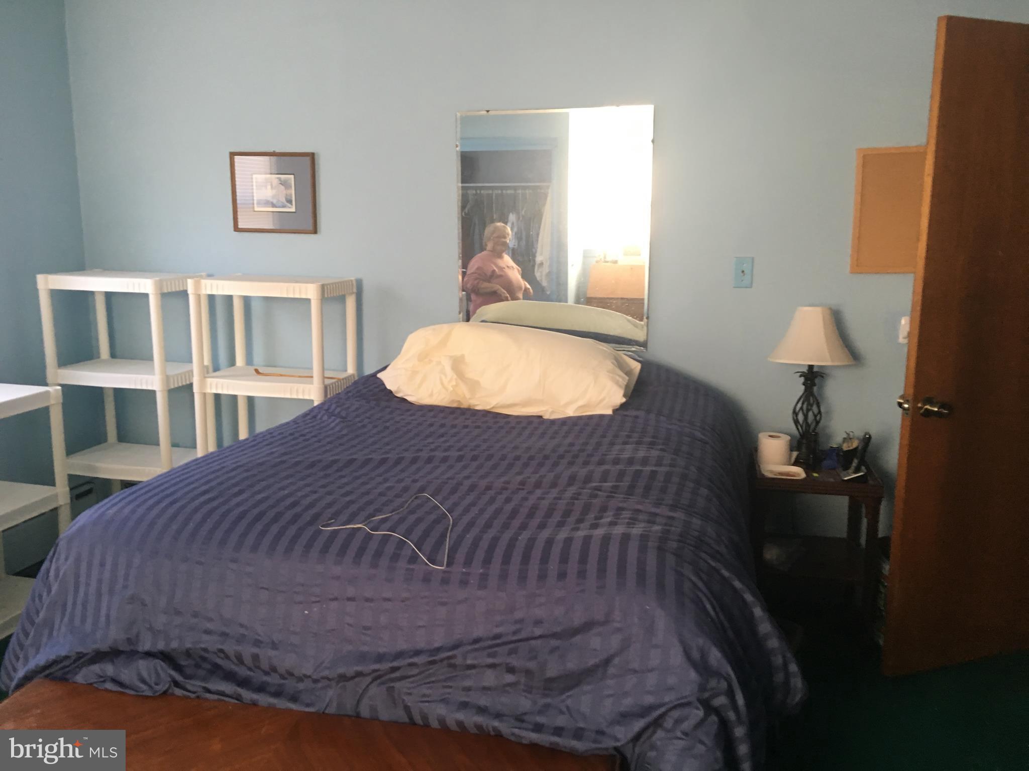 7300 Temple Hill Road Temple Hills, MD 20748 - Photo 8 of 14 a bedroom with a bed and a window