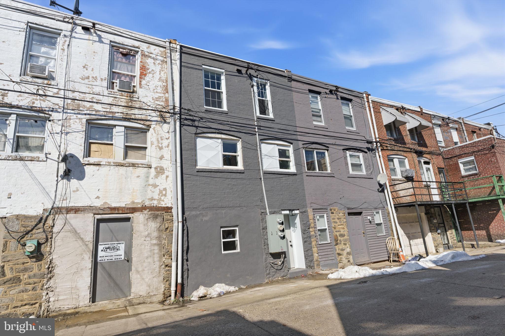 6508 Wheeler Street Philadelphia, PA 19142 - Photo 30 of 30 a front view of a building with many windows