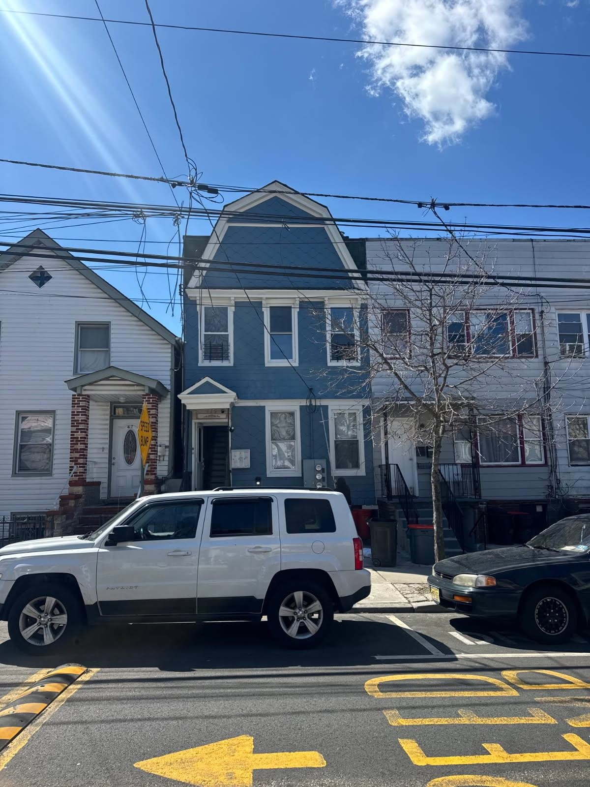 a car parked in front of a house
