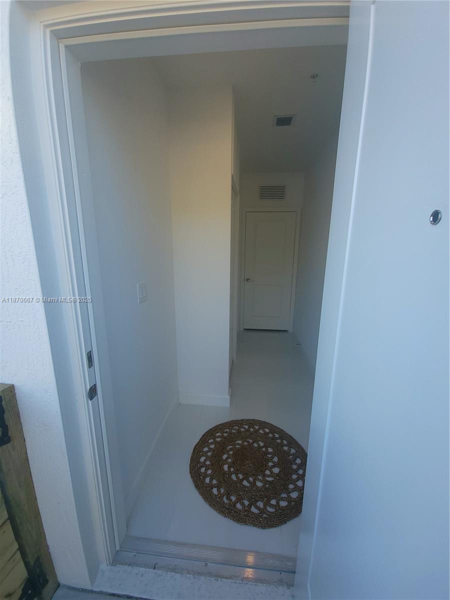 24600 Southwest 129th Avenue, Unit 9 Homestead, FL 33032 - Photo 2 of 11 entry hall