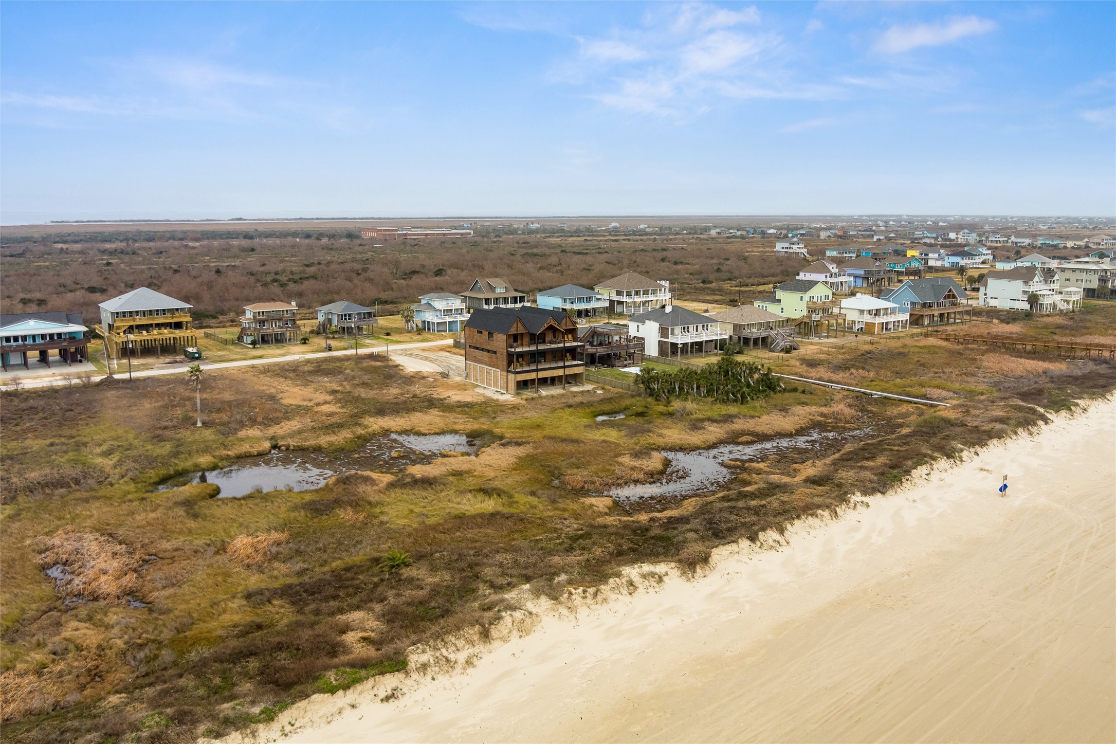 338 Atkinson Street Crystal Beach, TX 77650 - Photo 8 of 13 an aerial view of residential building and ocean