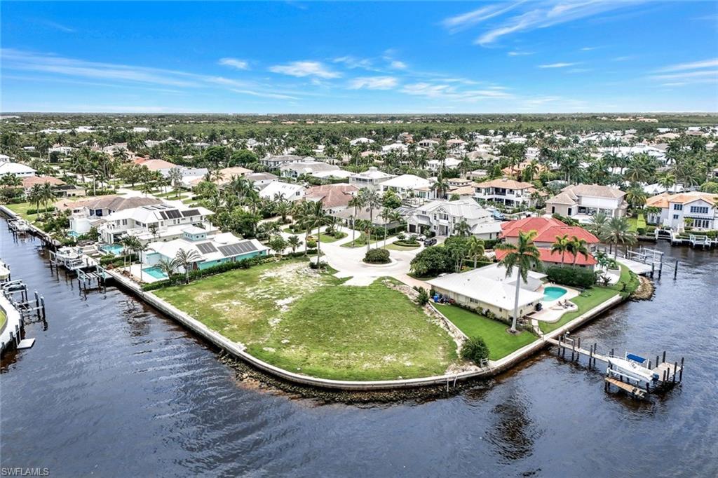 1303 Marlin Drive Naples, FL 34102 - Photo 6 of 15 Birds eye view of property with a water view