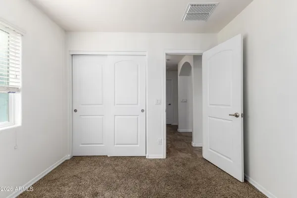 an empty room with window