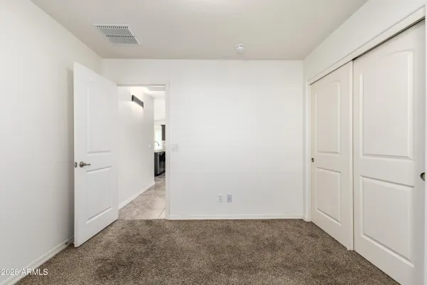 an empty room with an entryway