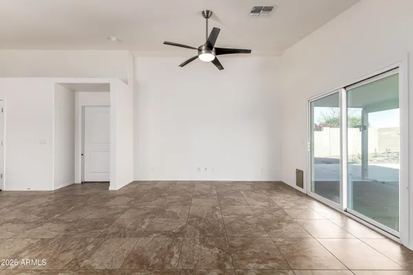 a view of an empty room and window