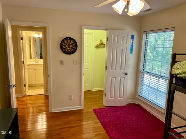 a view of an entryway with wooden floor