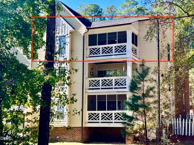a black and white photo of a living room