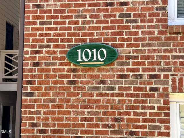 a view of house with flower pots