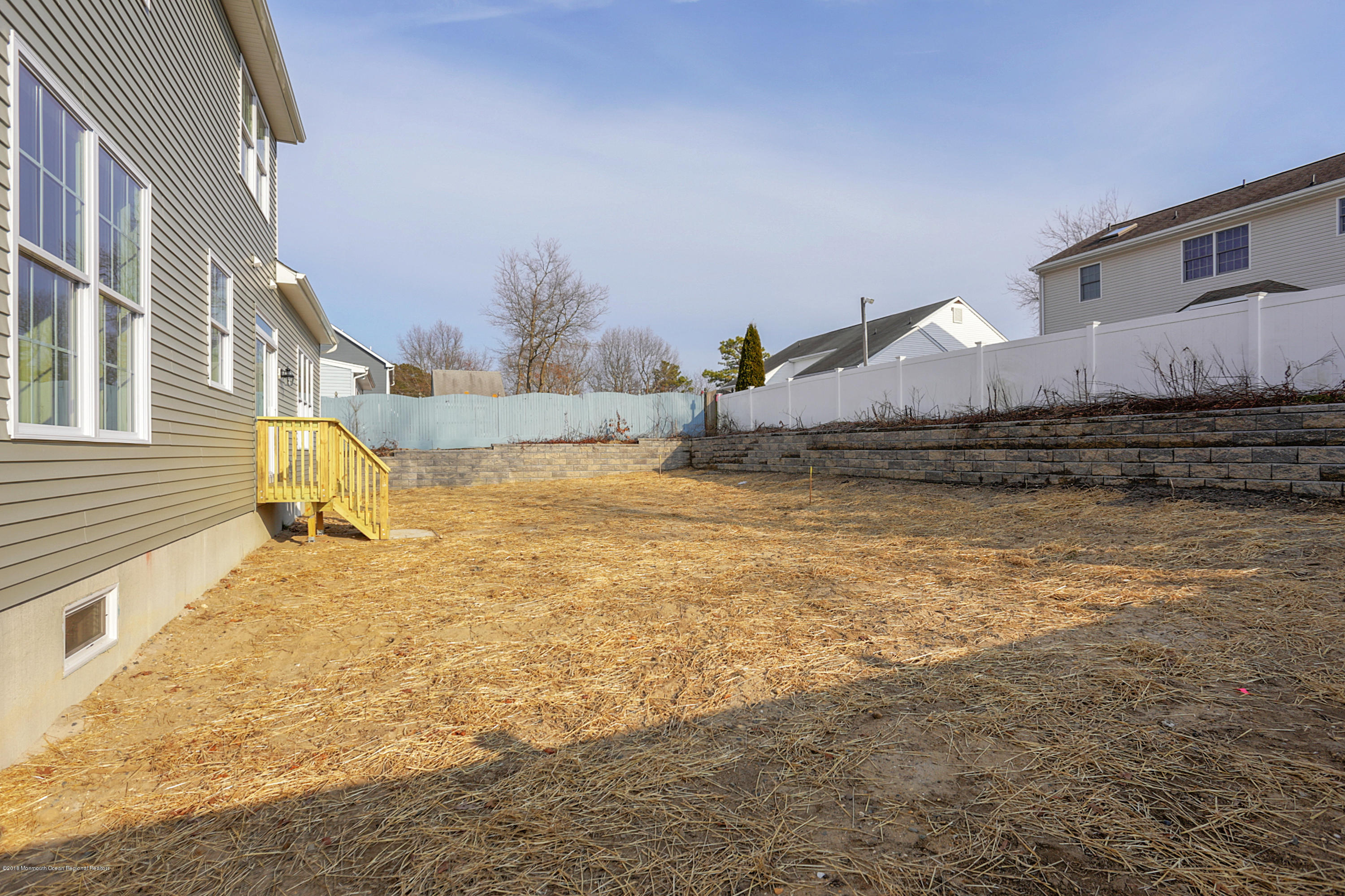 157 Bowline Road Manahawkin, NJ 08050 - Photo 7 of 29 a view of a house with a yard