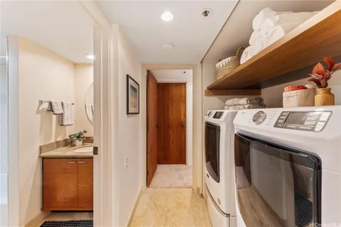 a utility room with dryer and washer