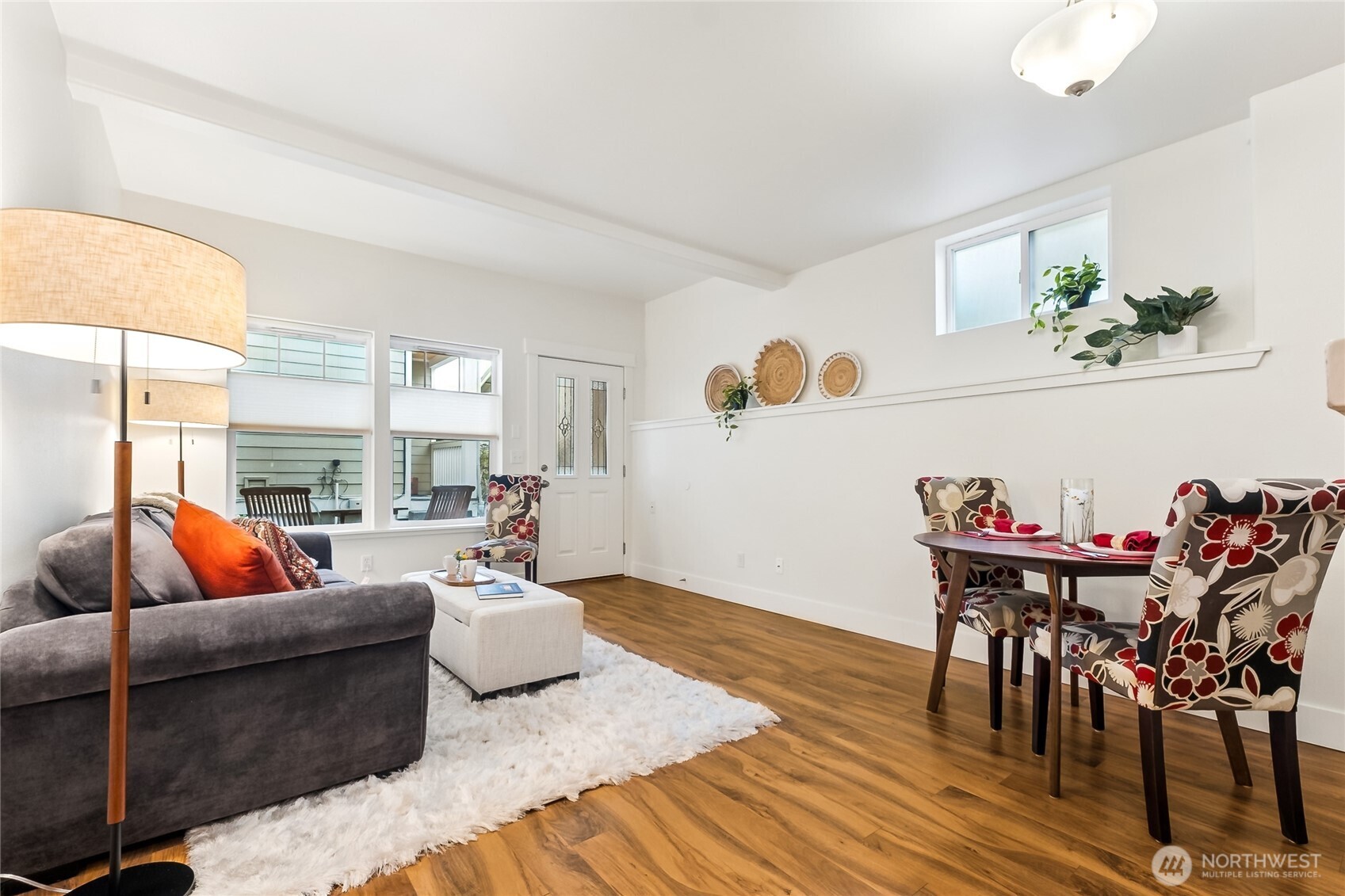 5907 40th Avenue Southwest, Unit B Seattle, WA 98136 - Photo 3 of 23 a living room with furniture and wooden floor