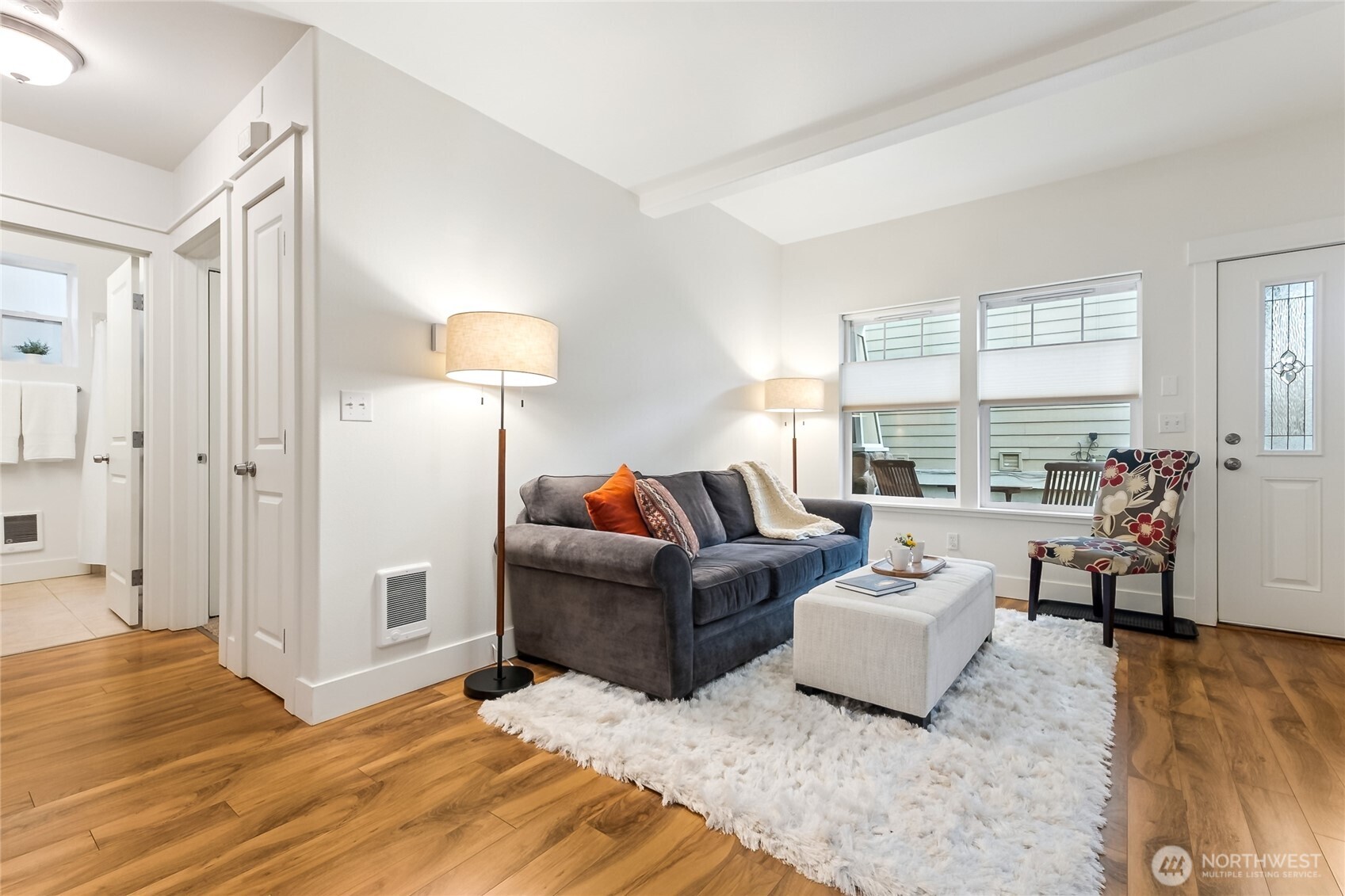 5907 40th Avenue Southwest, Unit B Seattle, WA 98136 - Photo 4 of 23 a living room with furniture and a table