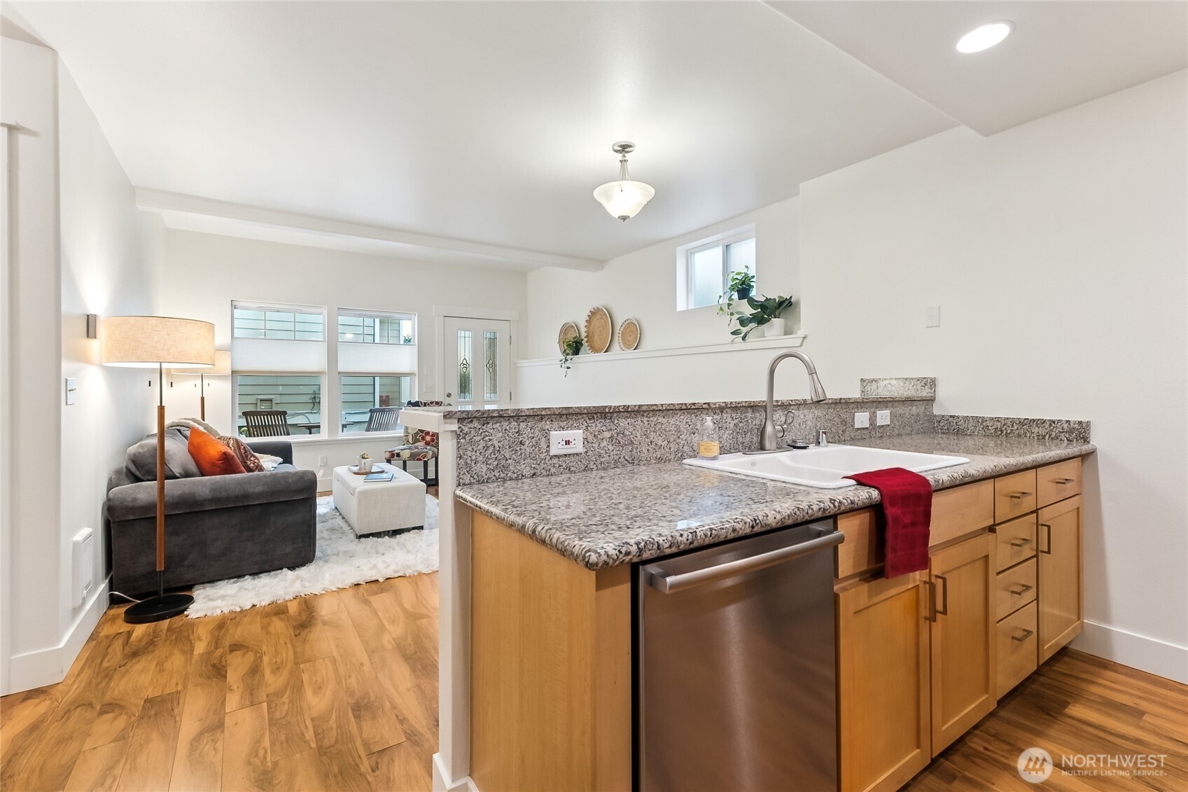 5907 40th Avenue Southwest, Unit B Seattle, WA 98136 - Photo 8 of 23 a kitchen with a stove and a refrigerator
