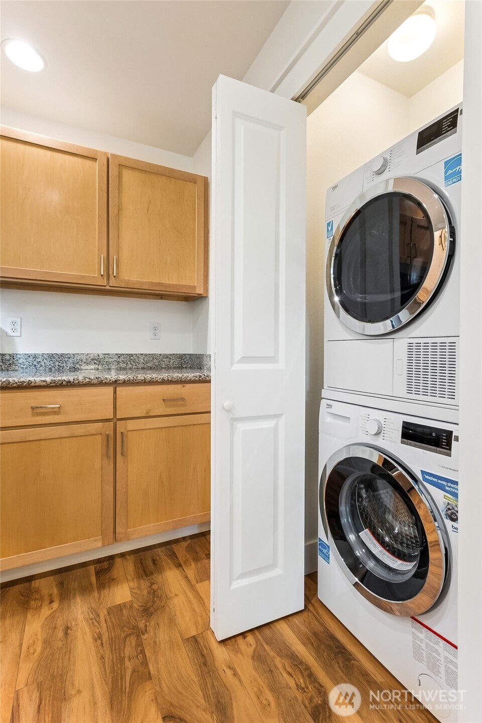 5907 40th Avenue Southwest, Unit B Seattle, WA 98136 - Photo 9 of 23 a view of a kitchen with washing machine and a sink