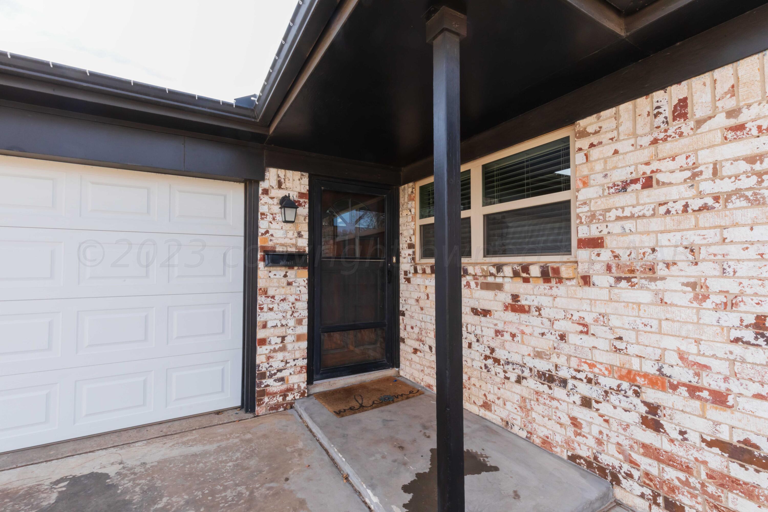 5201 South Austin Street Amarillo, TX 79110 - Photo 4 of 40 a view of door
