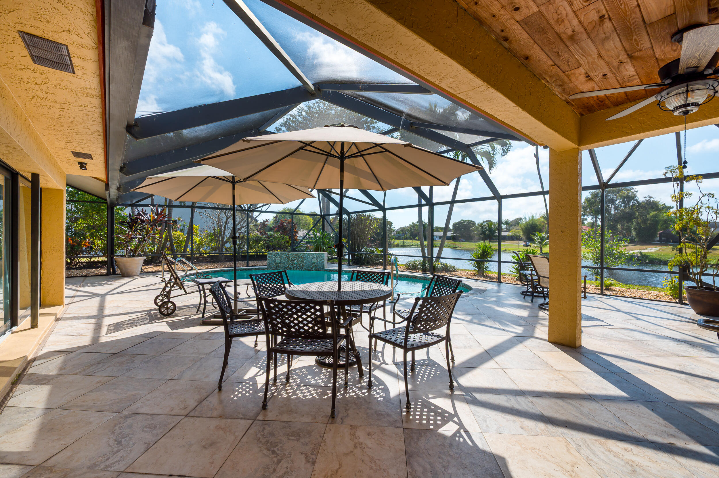 3250 Lakeview Boulevard Delray Beach, FL 33445 - Photo 2 of 26 a view of a backyard with sitting area