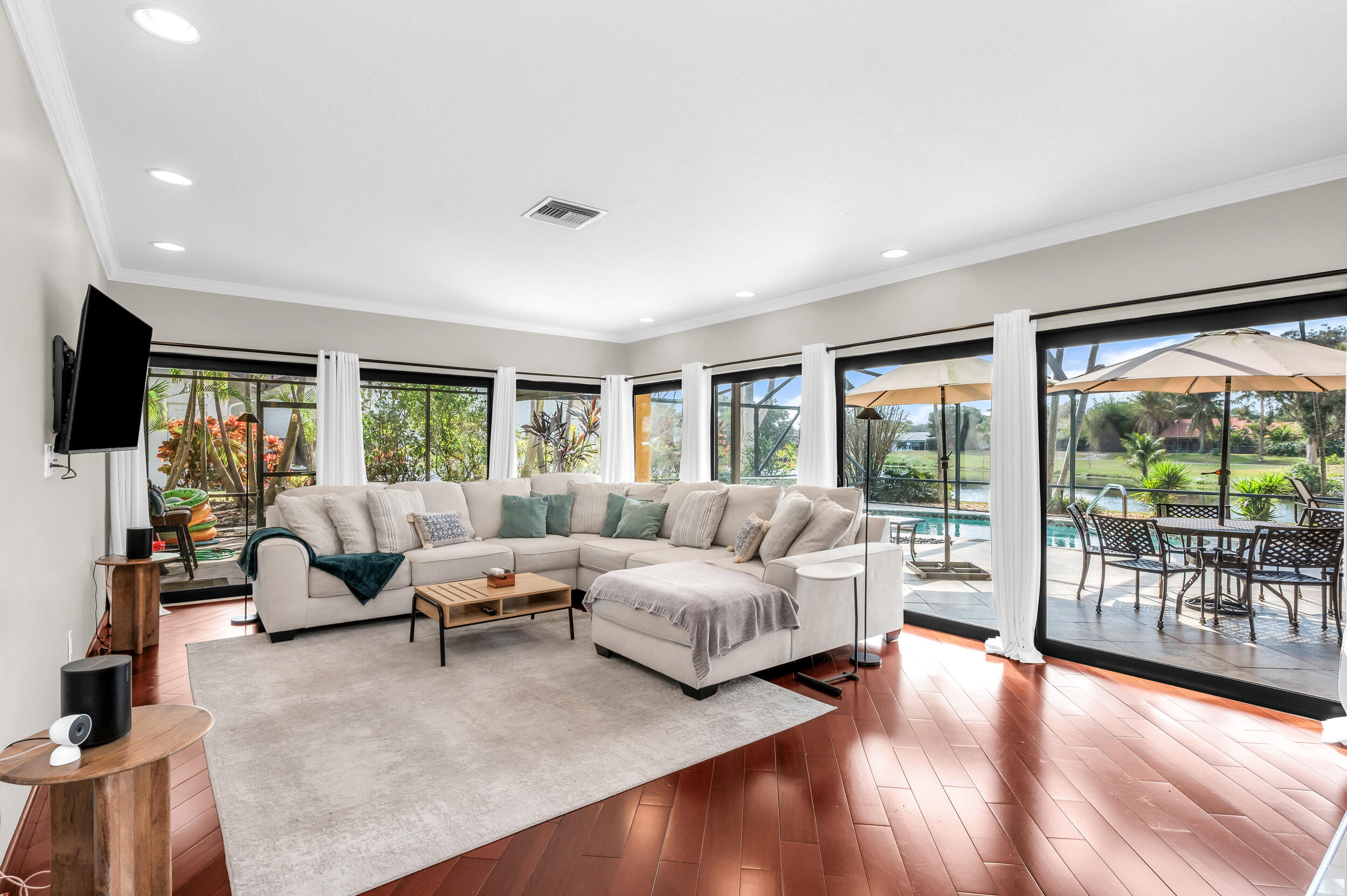 3250 Lakeview Boulevard Delray Beach, FL 33445 - Photo 3 of 26 a living room with furniture and a large window