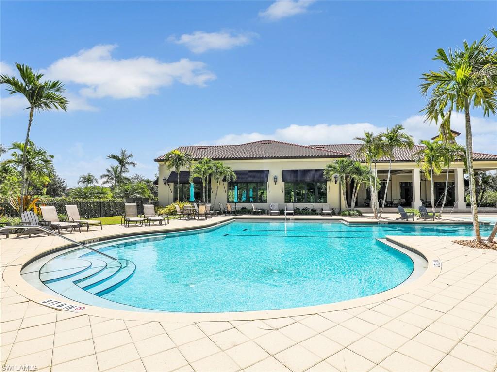 4383 Bismark Way Naples, FL 34119 - Photo 40 of 49 Community Pool & Rear View of Clubhouse