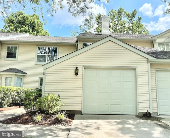 a view of a house with a garage