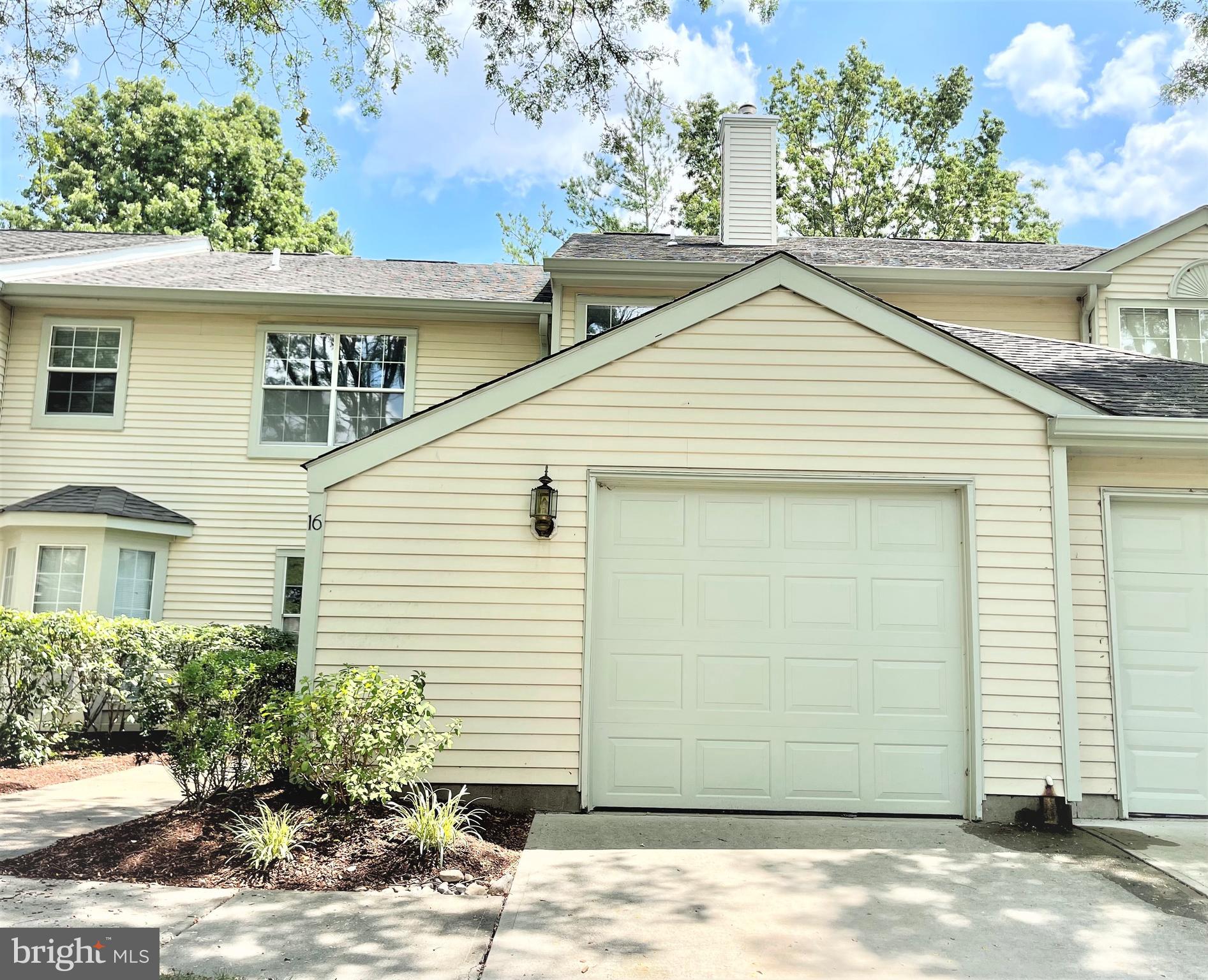a view of a house with a garage