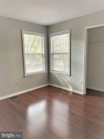 a bathroom with a toilet sink and shower