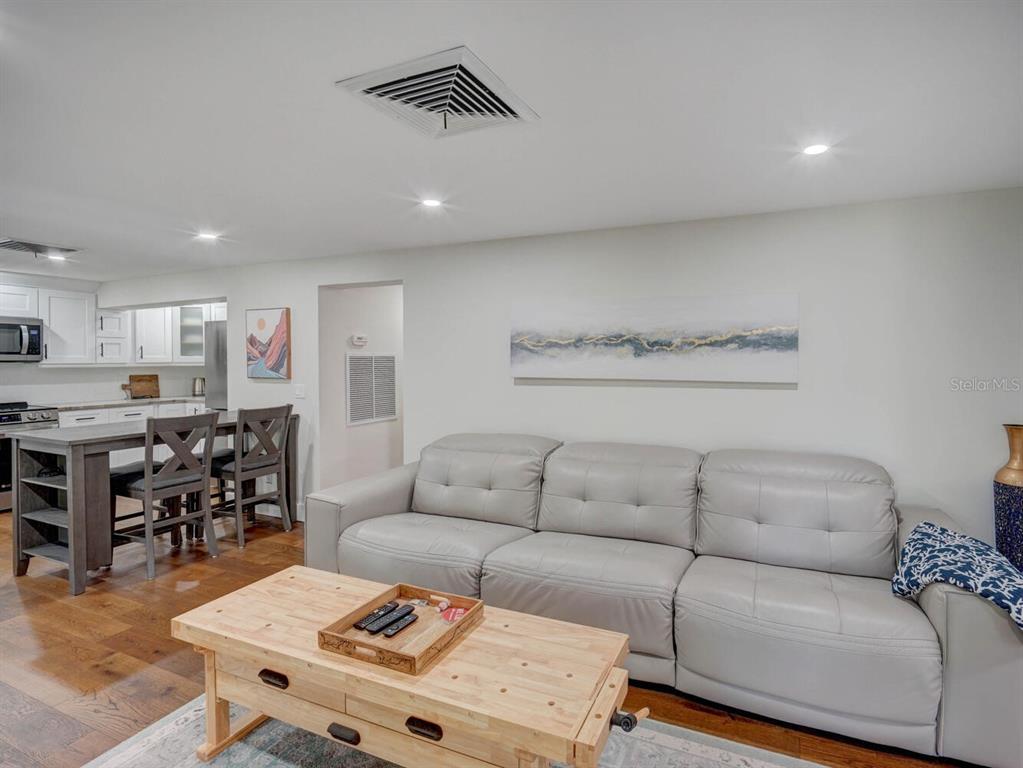 6746 River Road New Port Richey, FL 34652 - Photo 13 of 55 a living room with furniture and a table
