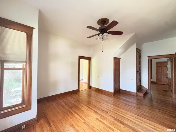 a view of an empty room and window