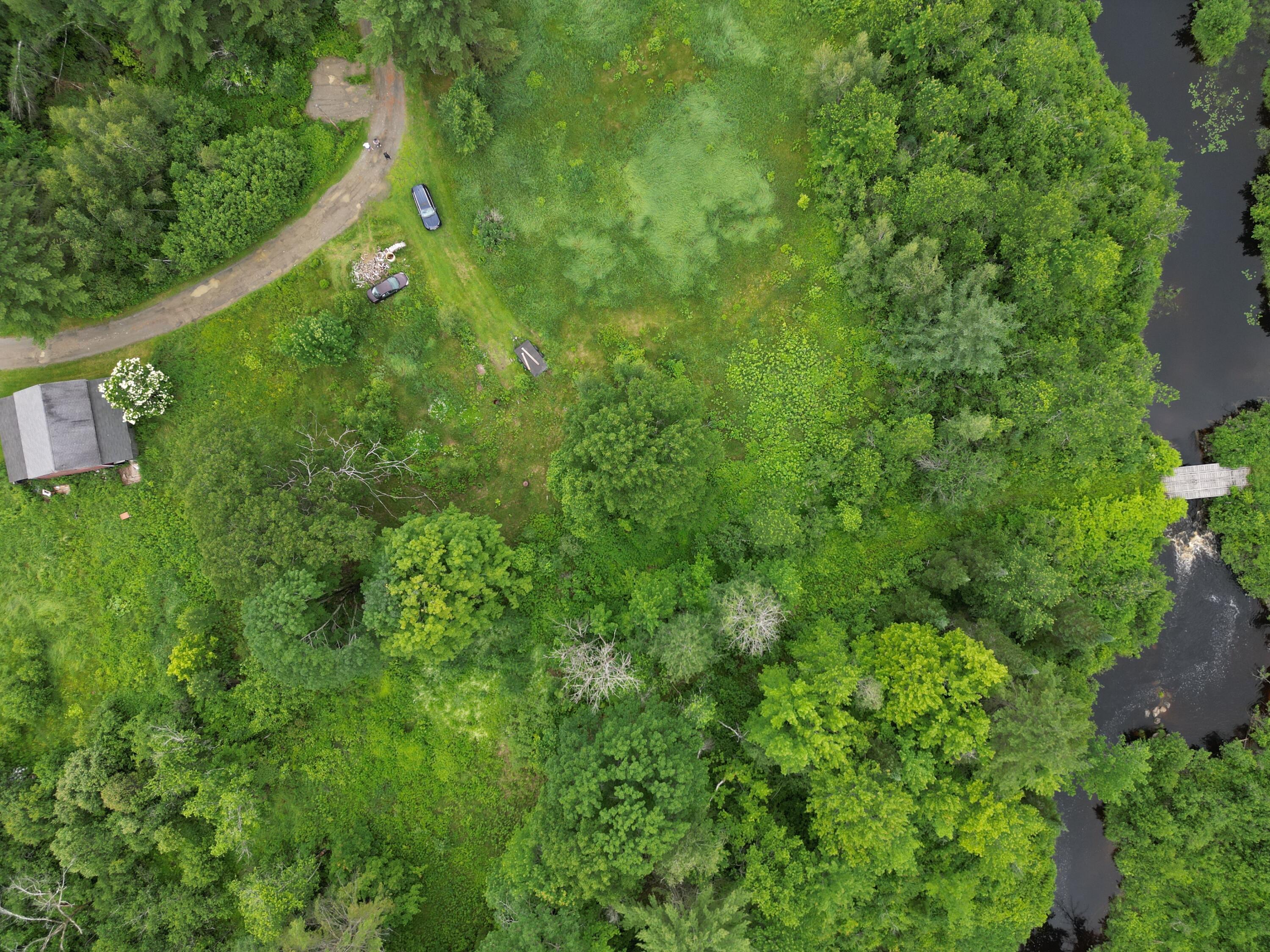 0 River Road Milo, ME 04463 - Photo 2 of 21 dji_fly_20230629_154534_327_168806473425