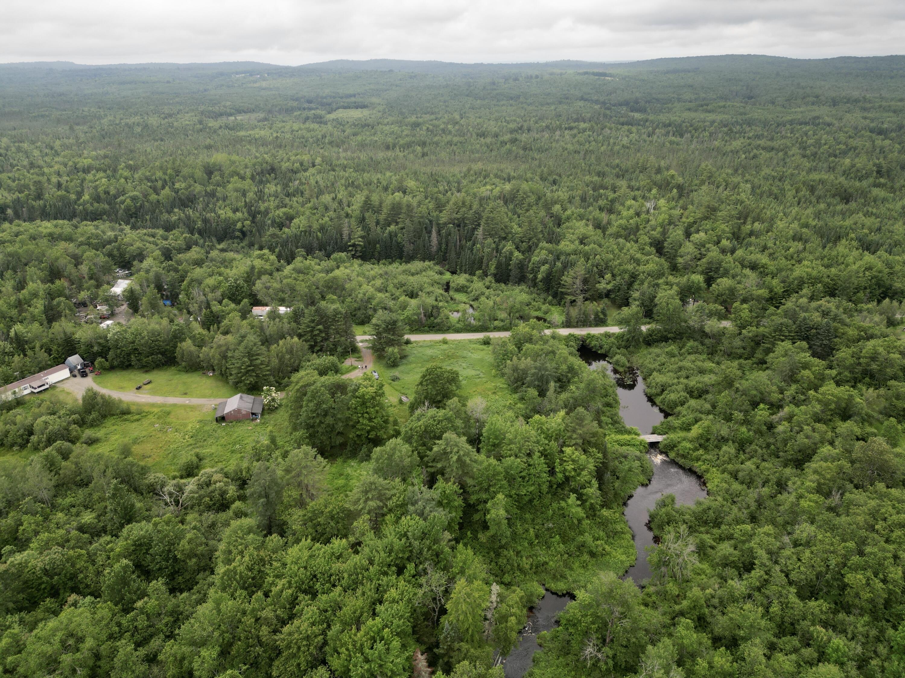 0 River Road Milo, ME 04463 - Photo 8 of 21 dji_fly_20230629_154456_325_168806473498