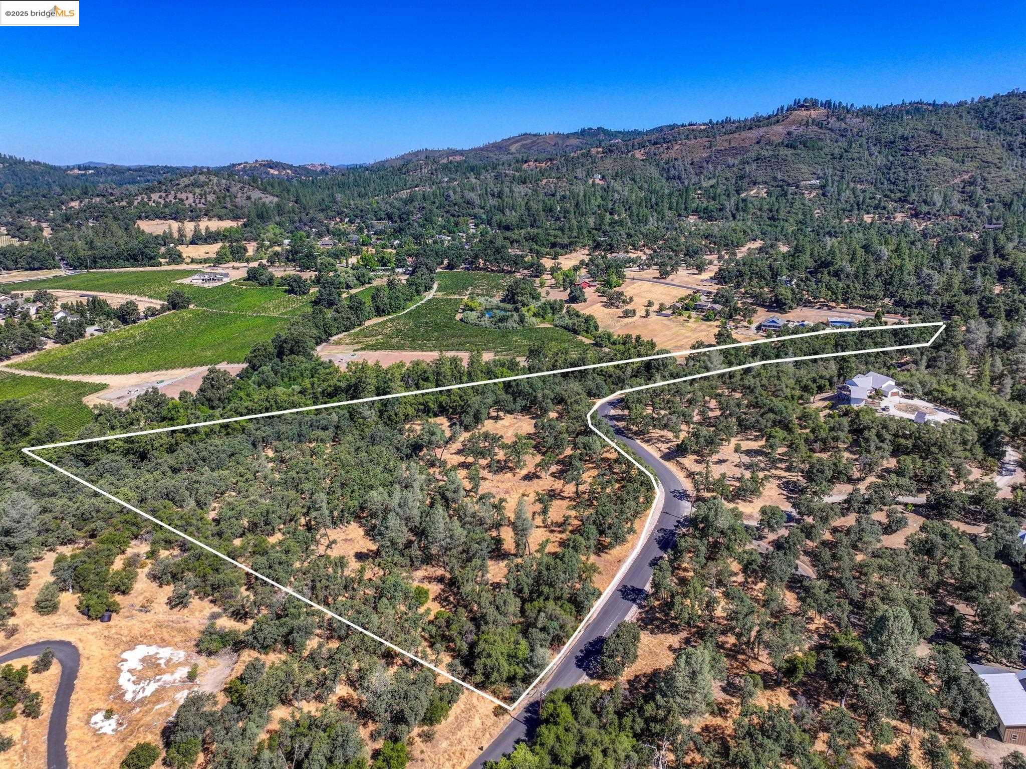 a view of a city with mountains in the background