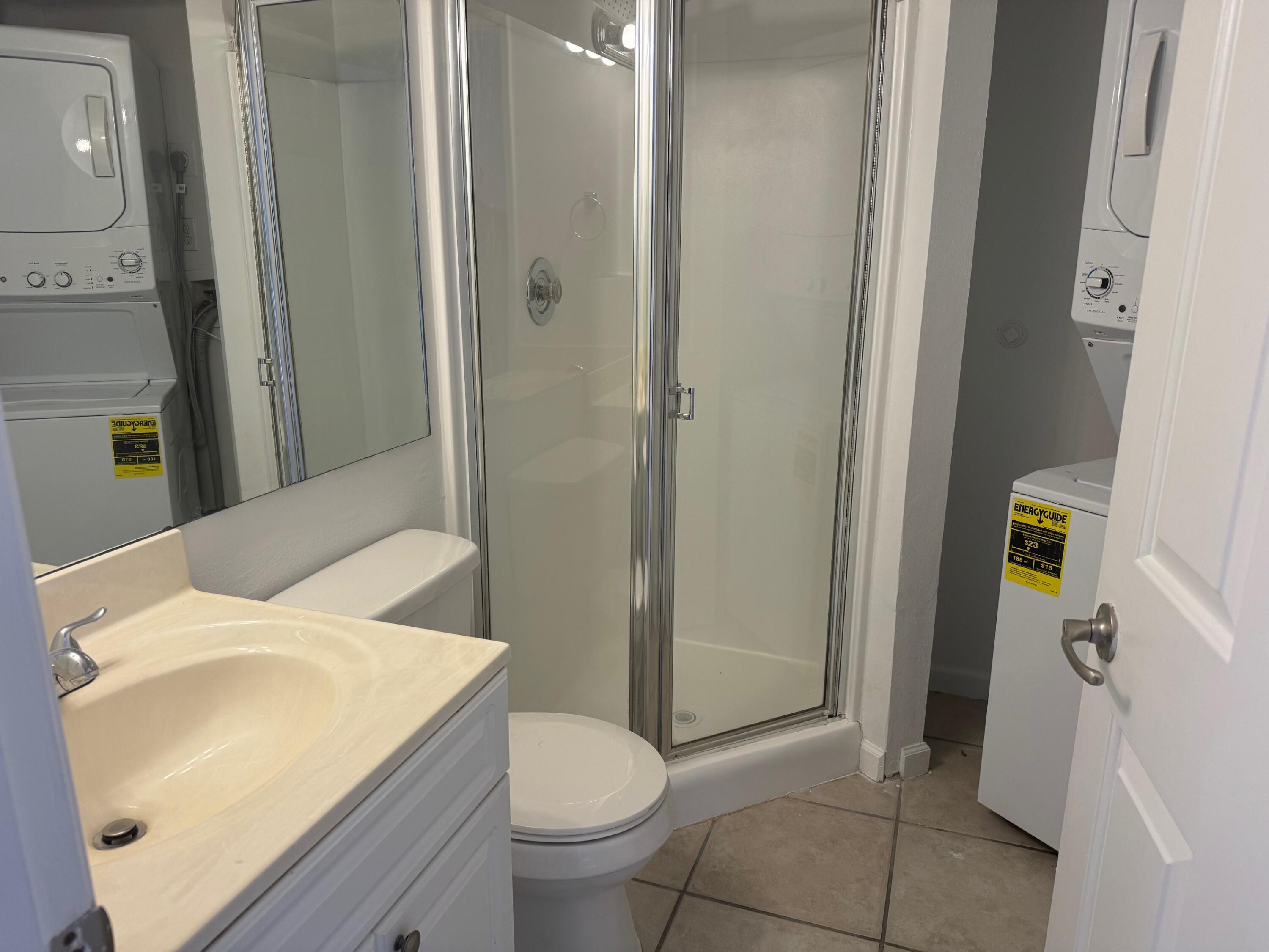 8068 Severn Drive, Unit B Boca Raton, FL 33433 - Photo 3 of 12 a bathroom with a sink and toilet