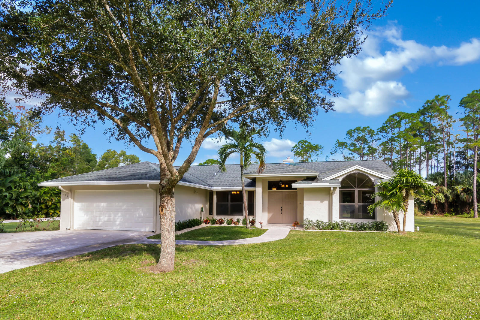 13391 153rd Road North Jupiter, FL 33478 - Photo 1 of 40 front exterior