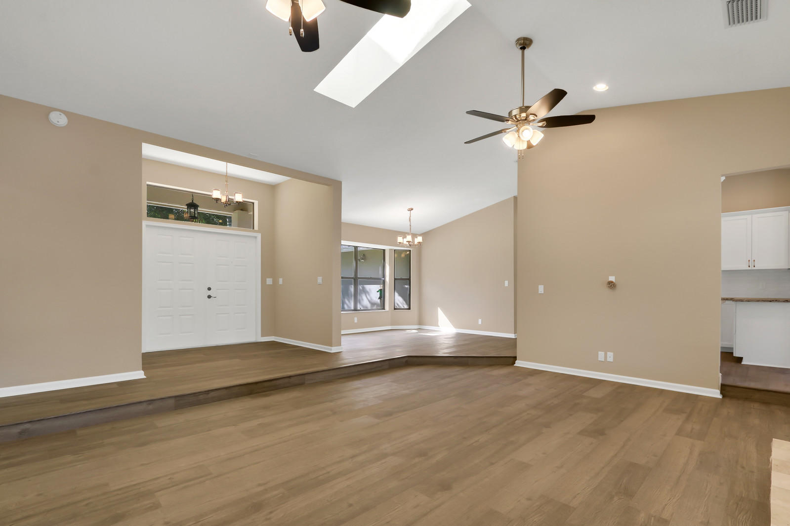 13391 153rd Road North Jupiter, FL 33478 - Photo 3 of 40 foyer and living room