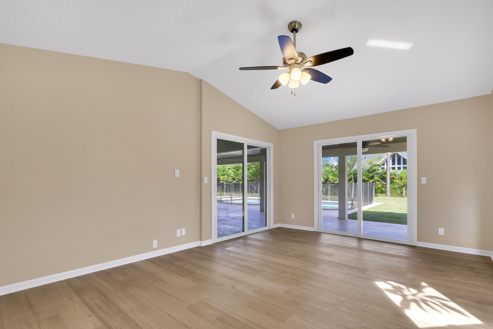 13391 153rd Road North Jupiter, FL 33478 - Photo 9 of 40 master bedroom with double sliders