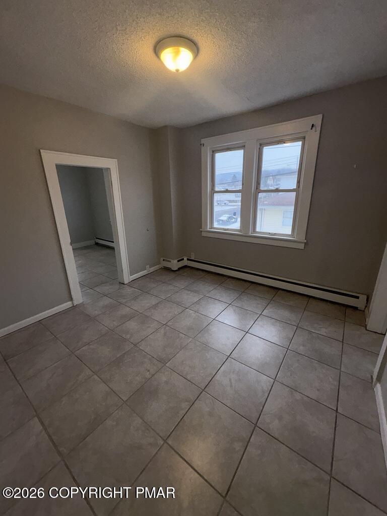 532 Cherry Street, Unit D Scranton, PA 18505 - Photo 18 of 26 a view of an empty room with a window