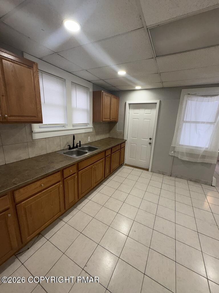 532 Cherry Street, Unit D Scranton, PA 18505 - Photo 3 of 26 a kitchen with stainless steel appliances a sink dishwasher and a refrigerator