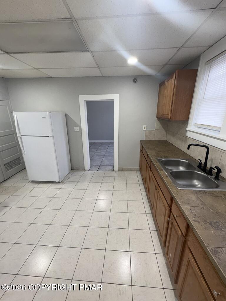 532 Cherry Street, Unit D Scranton, PA 18505 - Photo 7 of 26 a kitchen with a sink and a stove