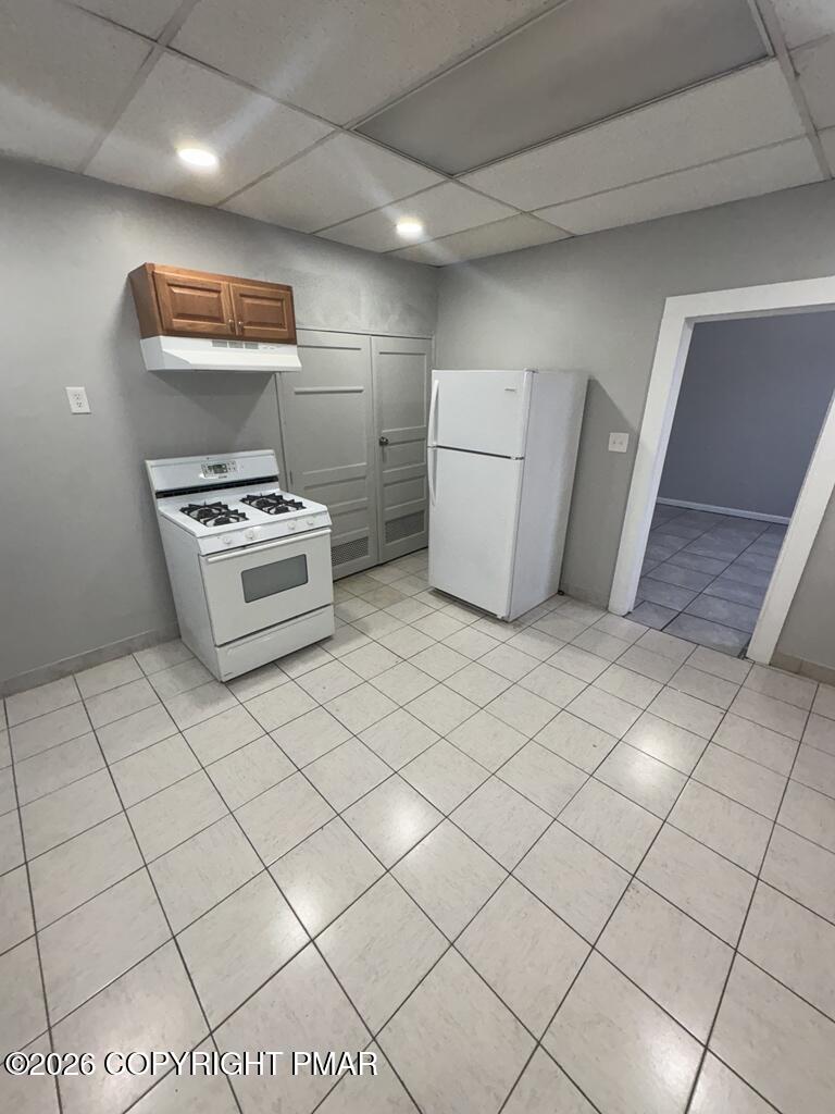 532 Cherry Street, Unit D Scranton, PA 18505 - Photo 8 of 26 a kitchen with cabinets and steel stainless steel appliances