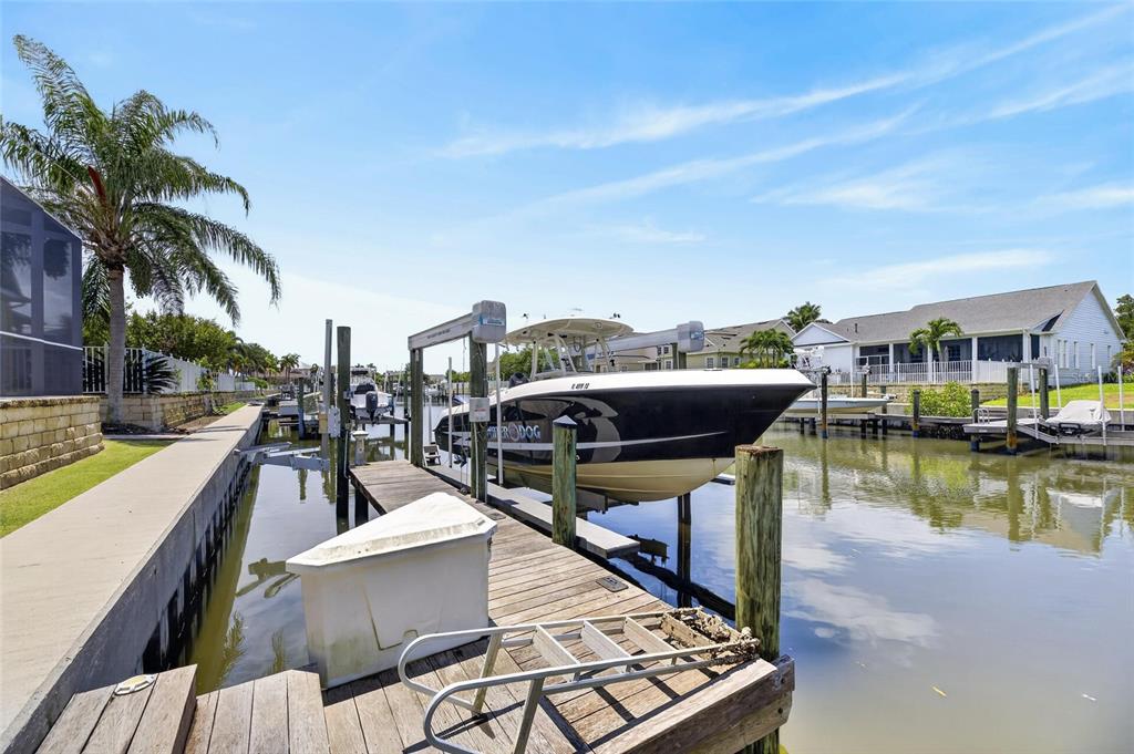 508 Islebay Drive Apollo Beach, FL 33572 - Photo 91 of 98 a view of a swimming pool with chairs