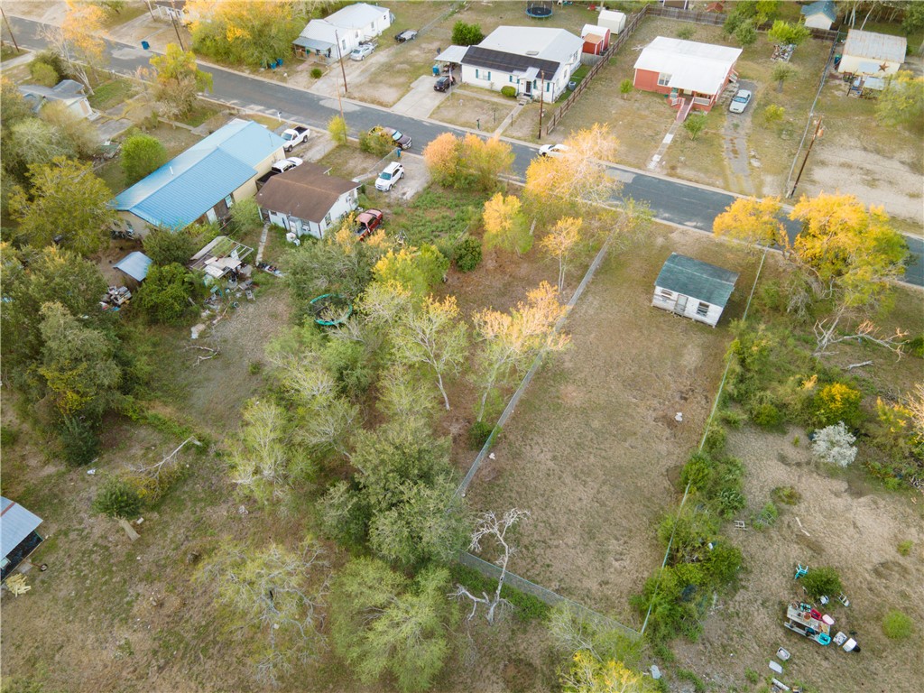 1405 West Springer Street Beeville, TX 78102 - Photo 15 of 20 an aerial view of residential houses with outdoor space