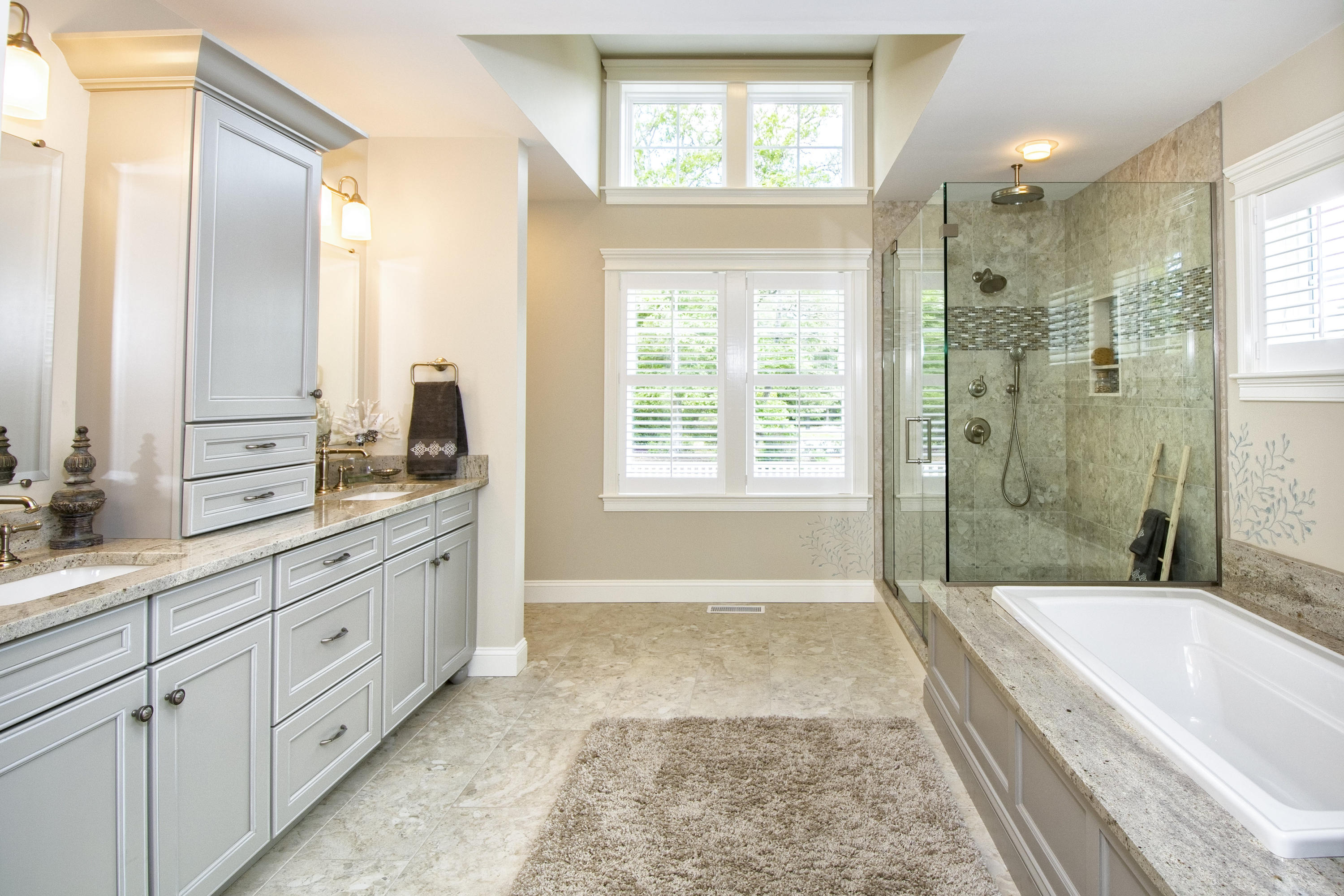 22 Cobblestone Circle Mashpee, MA 02649 - Photo 13 of 34 a spacious bathroom with a granite countertop tub sink shower and a mirror