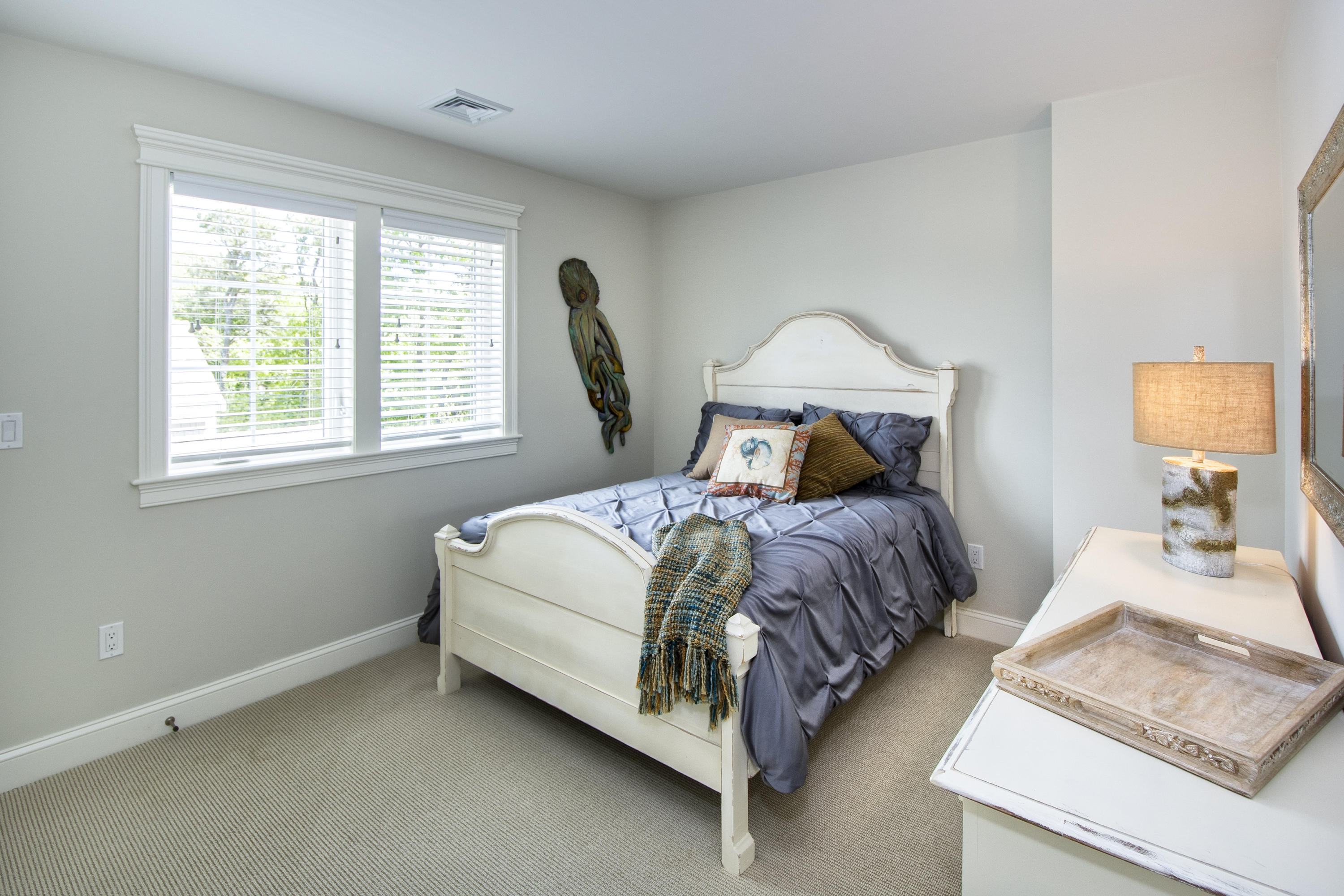 22 Cobblestone Circle Mashpee, MA 02649 - Photo 18 of 34 a bedroom with a bed rug and window
