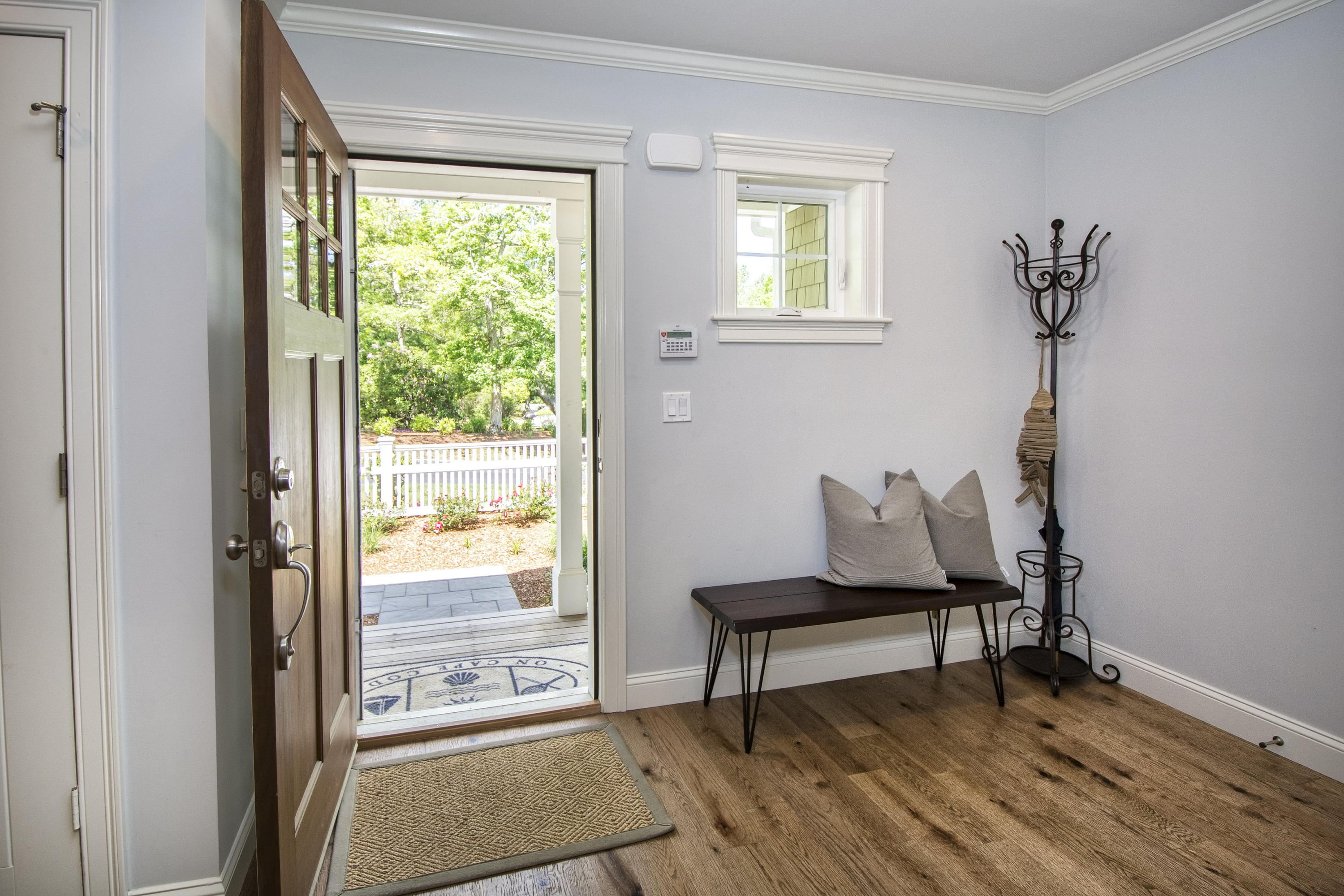 22 Cobblestone Circle Mashpee, MA 02649 - Photo 6 of 34 a living room with furniture and a window
