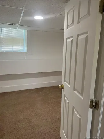 a view of a room with an empty space