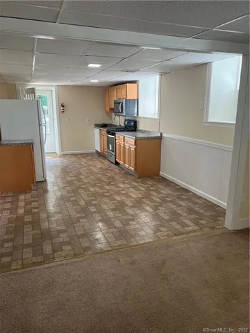 a view of a kitchen with a sink
