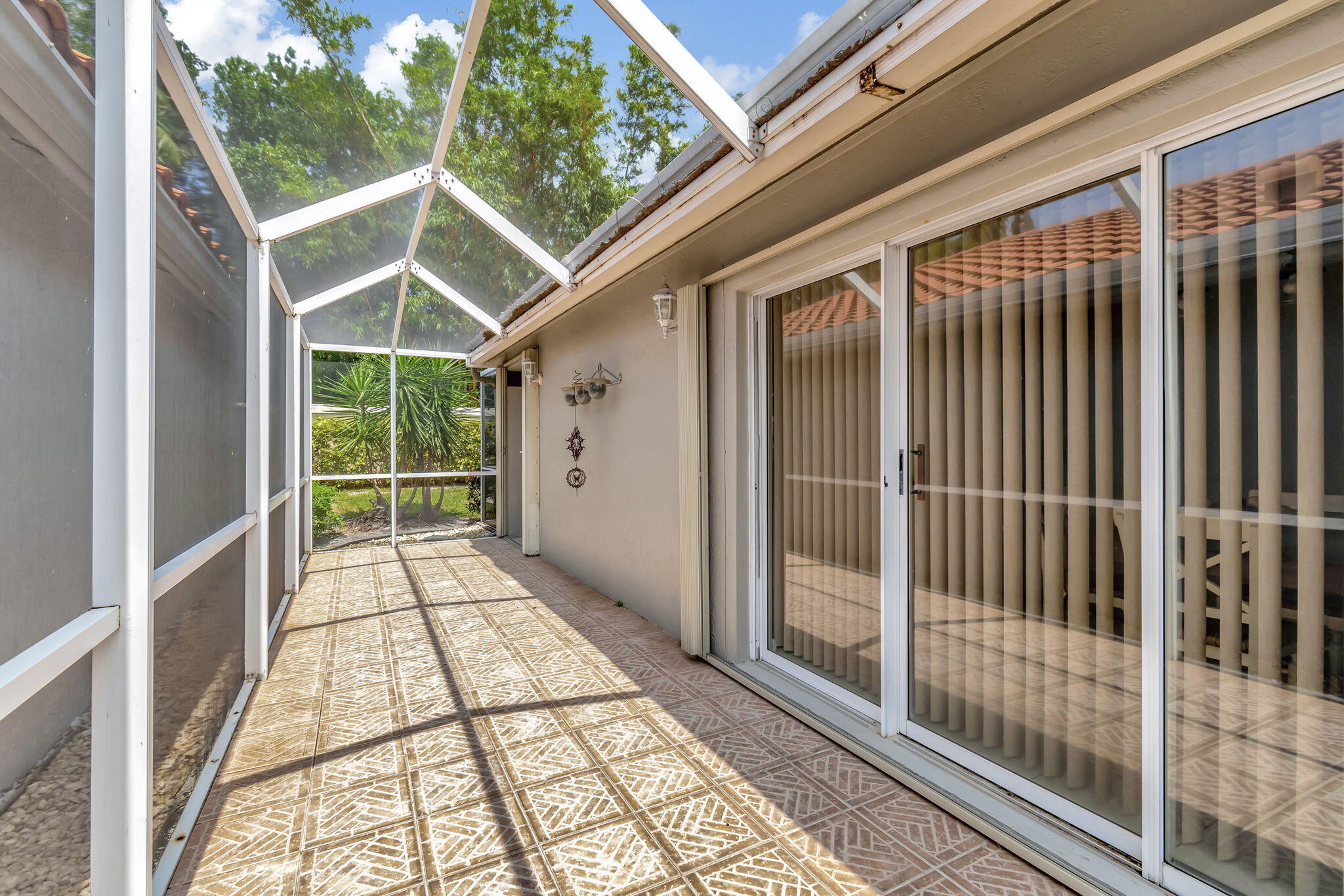 7445 Chorale Road Boynton Beach, FL 33437 - Photo 23 of 28 Wrap around Patio