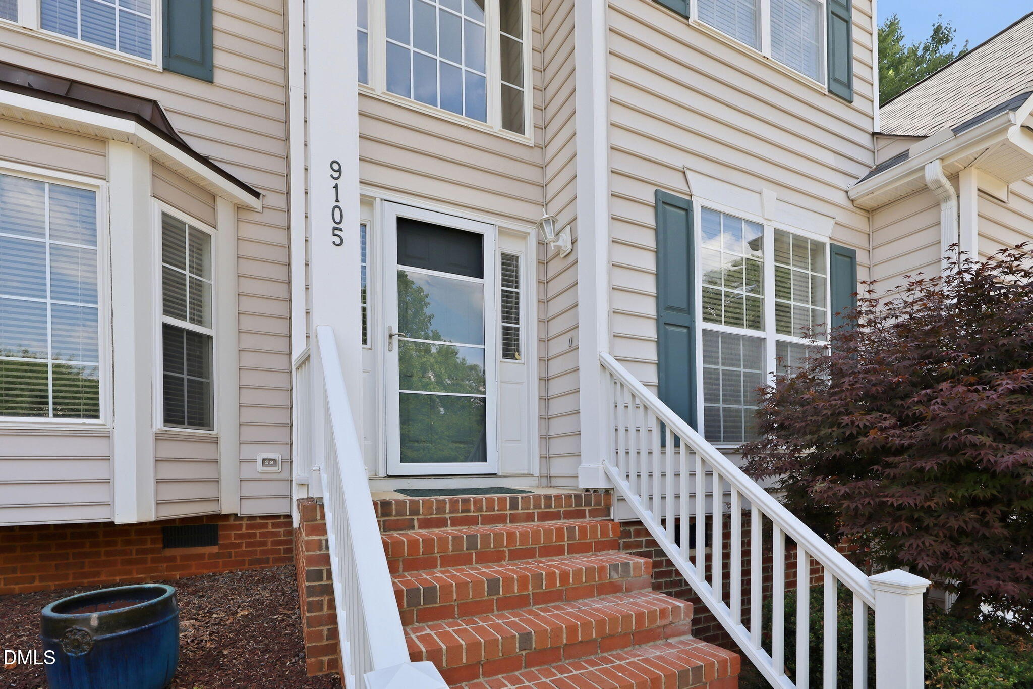 9105 Willow Valley Court Raleigh, NC 27617 - Photo 43 of 51 a view of a house with a window and stairs