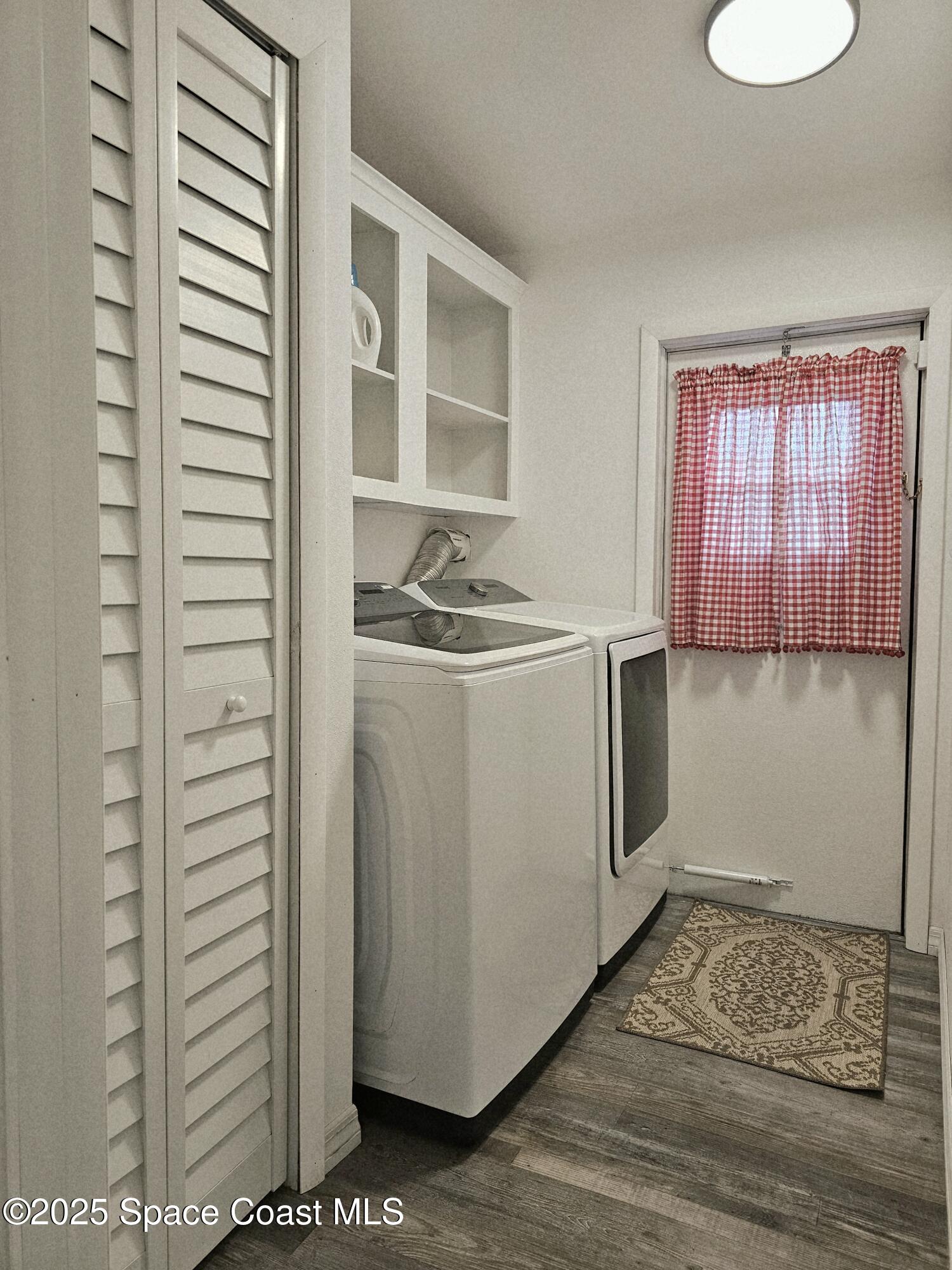 1809 Mango Street Northeast Palm Bay, FL 32905 - Photo 30 of 35 a utility room with cabinets