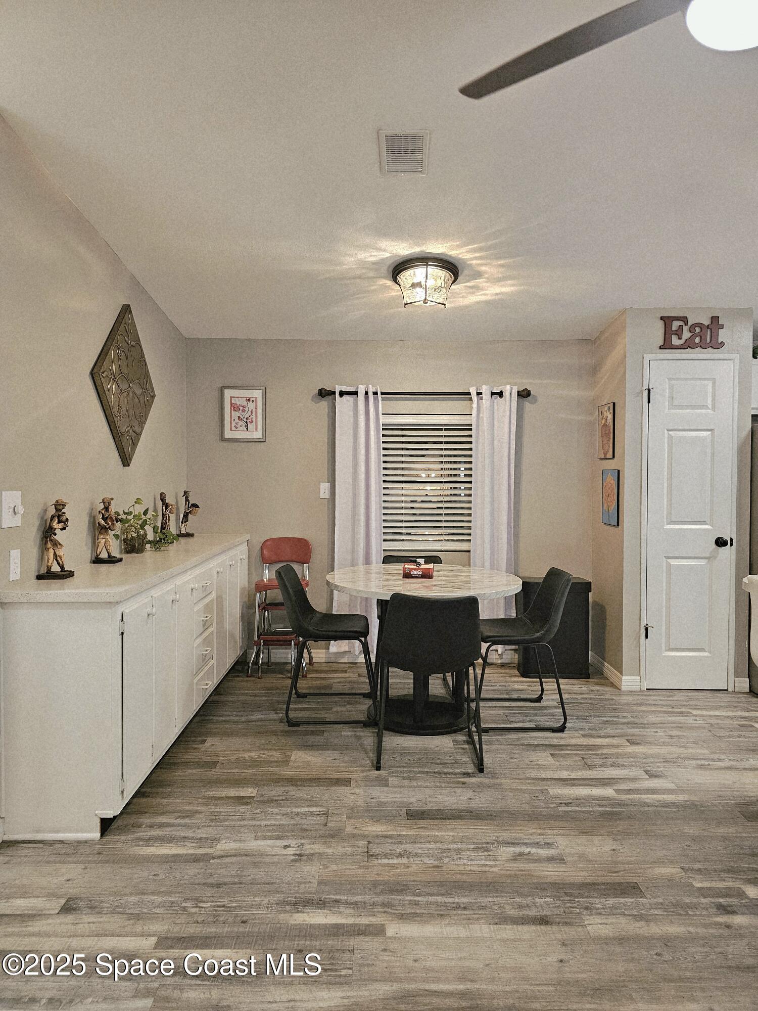 1809 Mango Street Northeast Palm Bay, FL 32905 - Photo 5 of 35 a living room with furniture